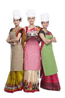 chef wearing apron with kitchen utensils