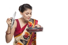 women with fry pan