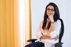 woman sitting in office