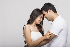 couple smiling and posing