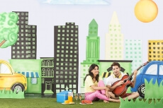 Couple playing guitar