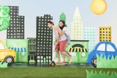Couple playing wit scooter
