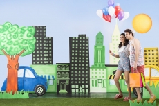 Couple having leisure time and holding balloons