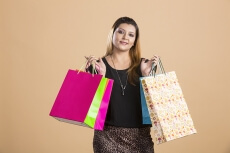 woman with carrying shopping bags