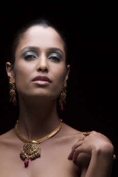 Woman flaunting her gold jewellery