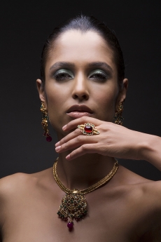 Woman flaunting her gold jewellery