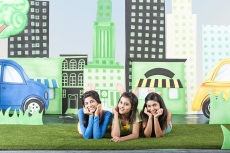 Three girls lying down and relaxing