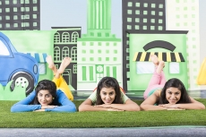 Three girls lying down and relaxing
