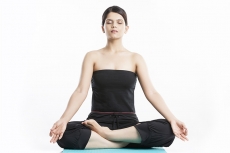 young woman doing yoga exercise