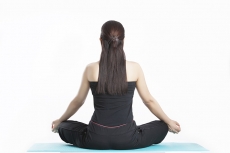  girl sitting in meditation