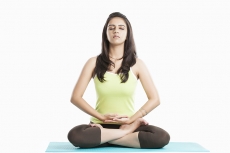 girl sitting in meditation