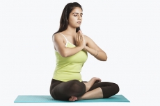 girl sitting in yoga pose
